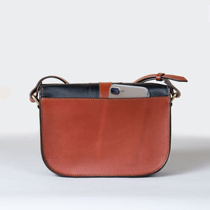 Signature Stirrup - Riding Stirrup Crossbody Luxury Leather Handbag in Cognac on Black